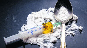 Woman among two held with 500-gm heroin, Rs 42,000