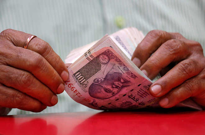 Rupee trips for 4th day, down 10 paise at 71.21 against USD