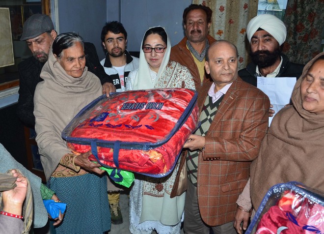 Blankets distributed to poor widows