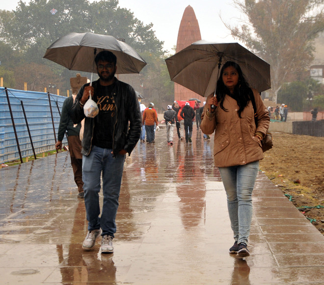 Chill makes a comeback after intermittent showers lash city