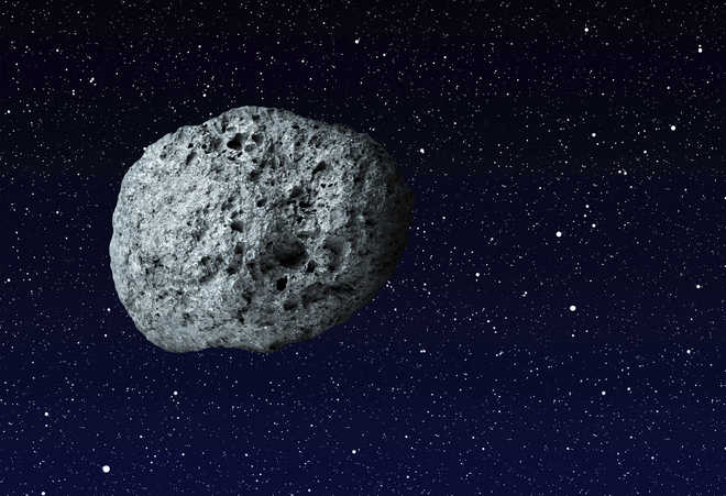 Asteroid samples escaping from jammed NASA spacecraft
