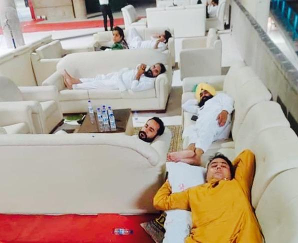 Demanding draft of new farm law, Punjab AAP MLAs spend night in Assembly building