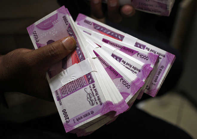 Rupee ends 7 paise lower against US dollar