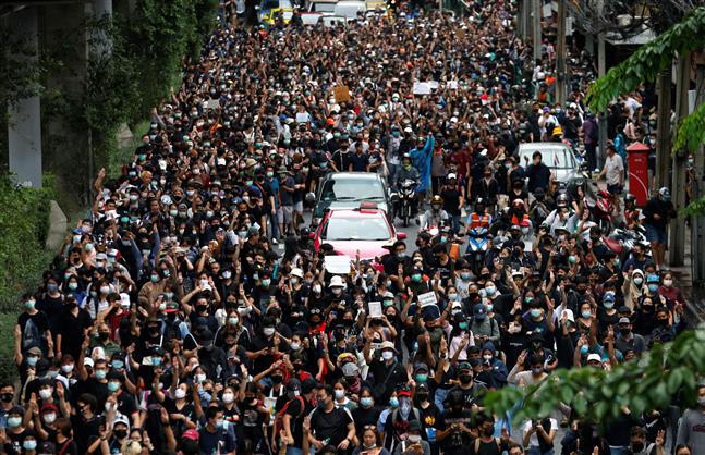 Tens of thousands protest across Thailand in defiance of ban