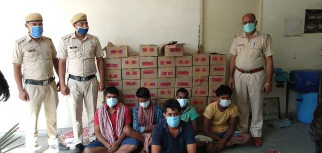 Illicit booze  seized in Faridabad, five arrested
