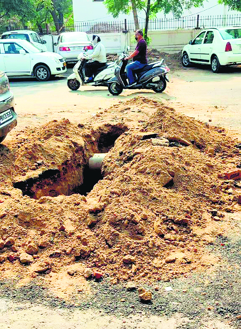 Day after recarpeting, Patiala MC digs up road in Chhoti Baradari to lay sewer