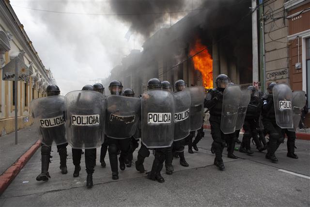 Protesters set fire to Guatemala's Congress in protests over 2021 budget