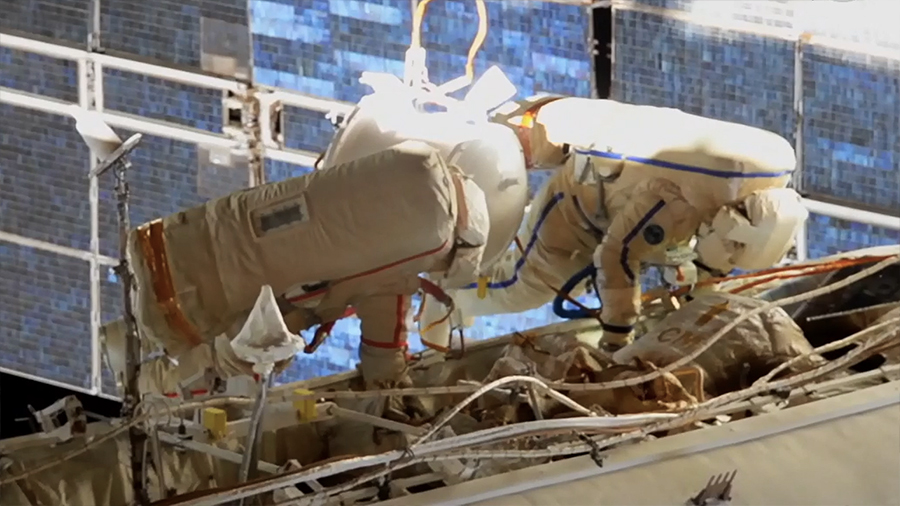 Russian spacewalk prepares space station for new module