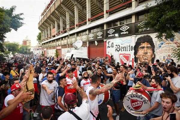 Argentina’s soccer fans weep for superhero Diego Maradona