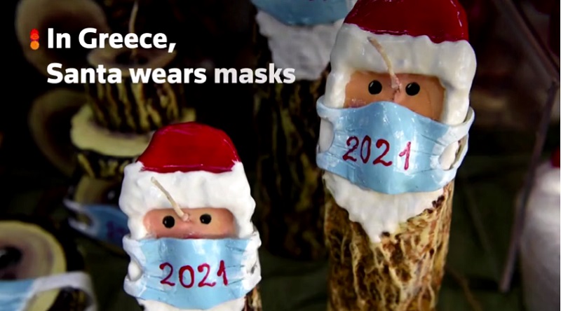 Santa candles get masked up in Greece in COVID-19 surge