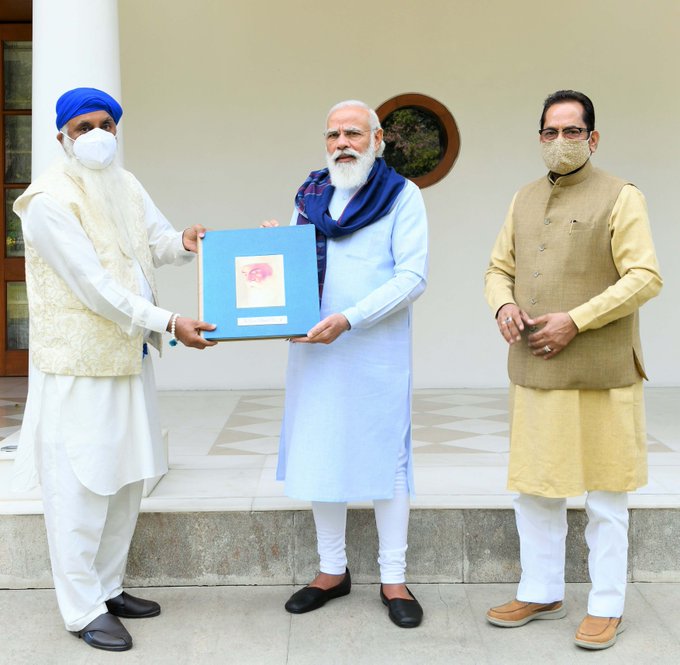 PM Modi releases book on life and ideals of Guru Nanak Dev