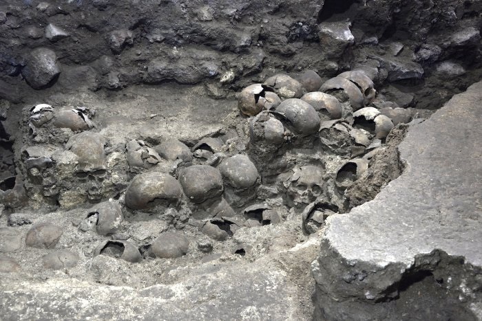 Mexican archaeologists uncover facade of Aztec skull tower in capital