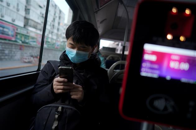 As coronavirus death toll climbs to over 2,200, Xi says disease yet to peak
