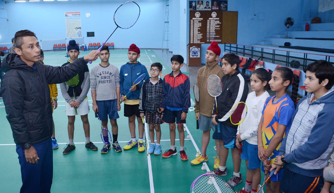 Malaysian badminton coach visits city academy