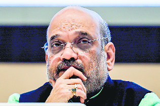 Shah regrets goli maro barb during Delhi poll
