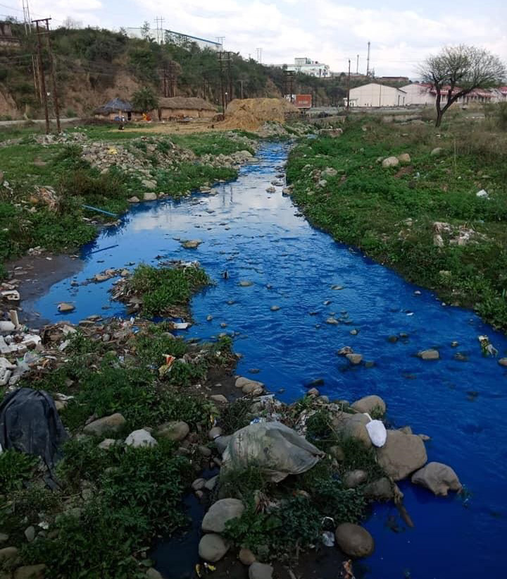 Water body in Baddi turns blue after industrial waste dumped
