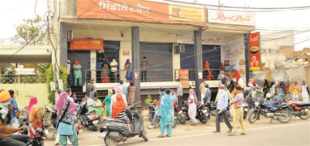 Jan Dhan a/c holders in Amritsar queue up outside banks