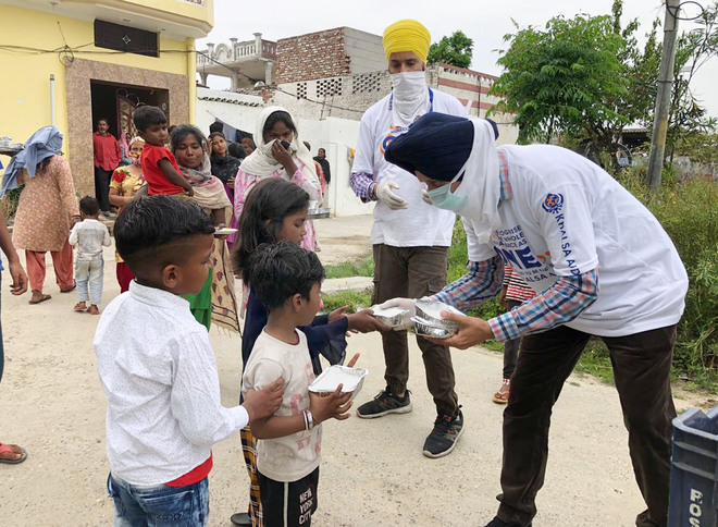 Khalsa Aid volunteers help soften the blow for needy