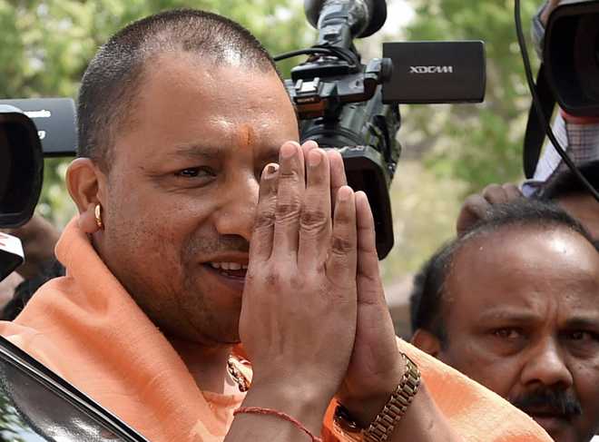 Yogi takes U-turn, gives up on permission issue for migrants