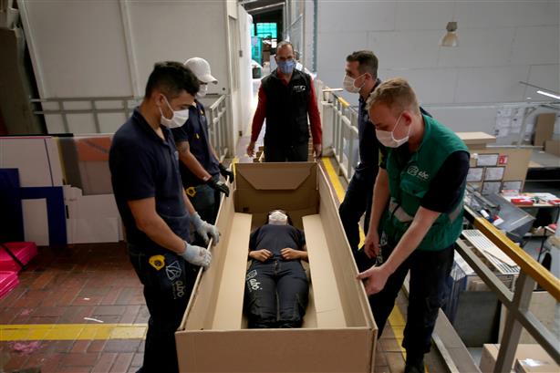 Pictures: Beds that convert into coffins as coronavirus body count rise