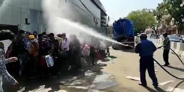 Migrant workers sprayed with disinfectant in south Delhi, civic body says 'by mistake': Watch video