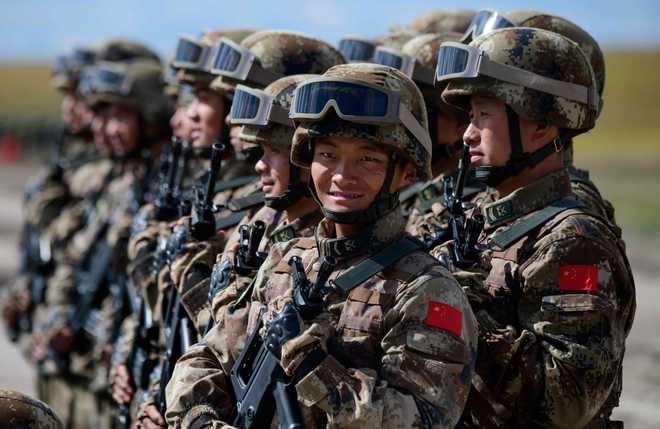 China claims its troops patrolling on Chinese side of LAC