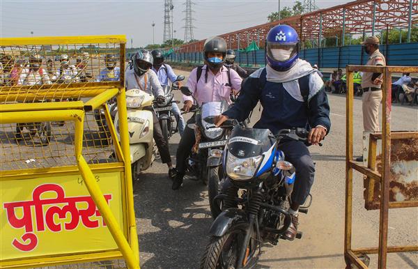 Delhi govt reduces 14-day mandatory home quarantine to 7 days for asymptomatic travellers