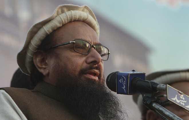 Pak court indicts JuD chief Hafiz Saeed's 4 close aides in terror financing case