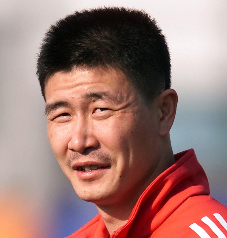 Former China soccer star calls for ouster of Communist Party