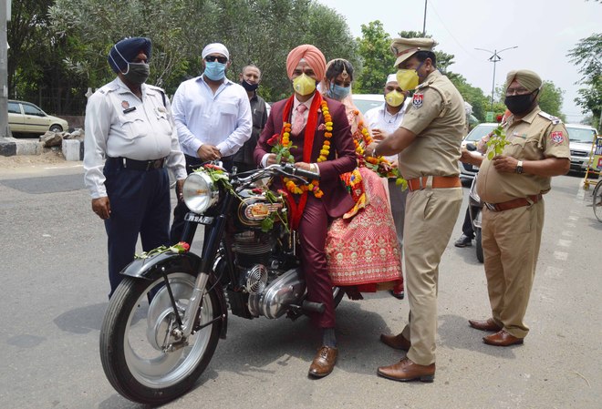 Marriage in Covid times: No ‘baraat’, bike replaces ‘doli’