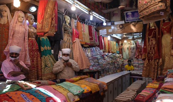 No customers, cloth traders, tailors hit hard in Mandi