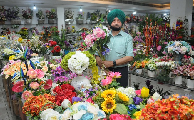 As demand for fresh flowers slumps, this florist shifts to artificial ones