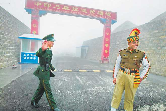Go by pacts, raze new structures, China told