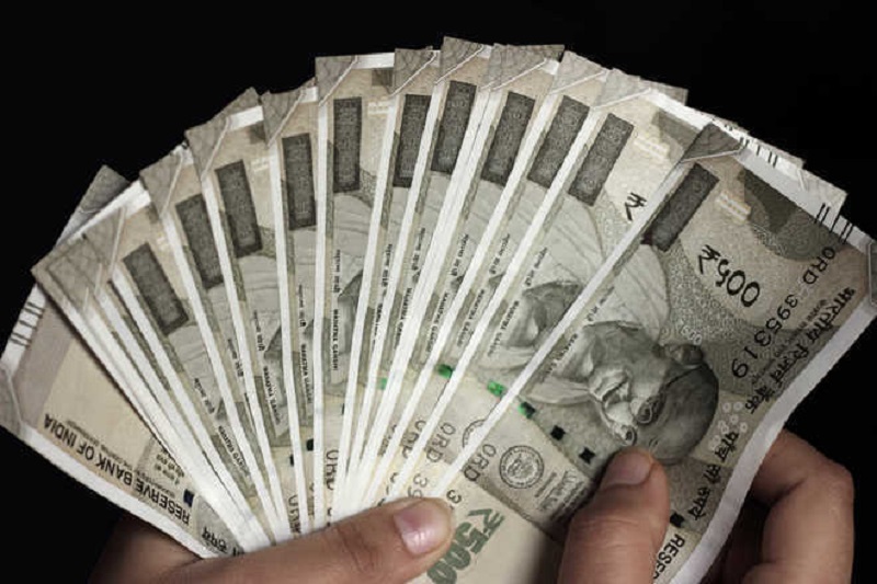Rupee slips by 2 paise to end at 74.68 as crude firms up