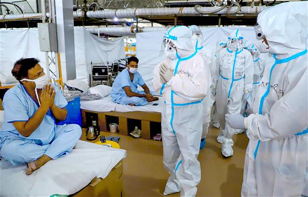 Record spike of 28,701 Covid-19 cases takes India’s tally to 8.78 lakh