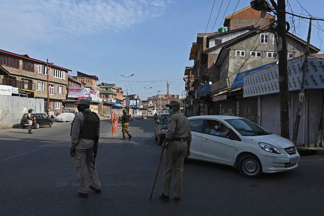 Amid surge, curbs back in Kashmir