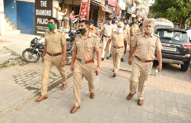 Chandigarh cops hold flag march in Burail, Ram Darbar