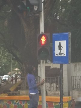 Gender parity: Female figures in Mumbai traffic signal lights