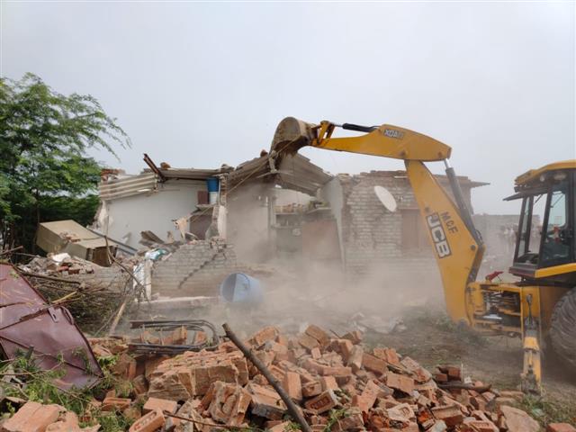 Faridabad Municipal Corporation carries out demolition drive in village located in Aravali forest area