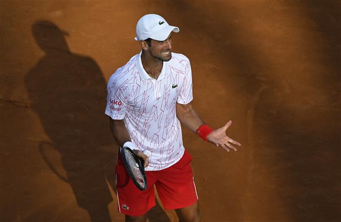 ‘I deserved it’: Novak Djokovic gets obscenity warning in semifinal win