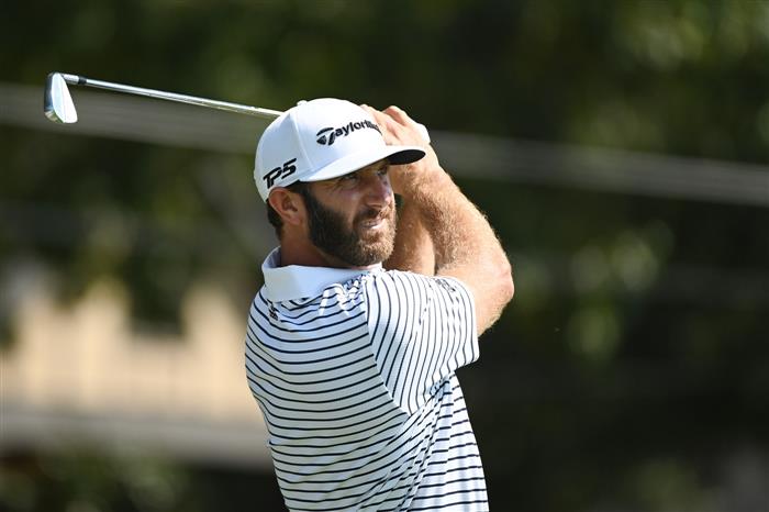 Another trophy for golfer Dustin Johnson, this one without the cash