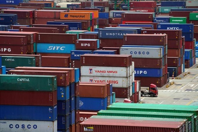 China 2020 exports up despite virus; surplus surges to $535 billion