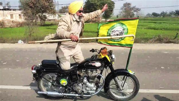Riding high on wheels & emotions, 47-yr-old Punjab biker stuns commuters with stunts
