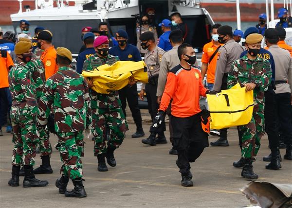 Search expands for victims of Indonesian plane crash