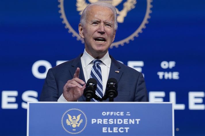 In Georgia, Biden’s presidency meets early defining moment