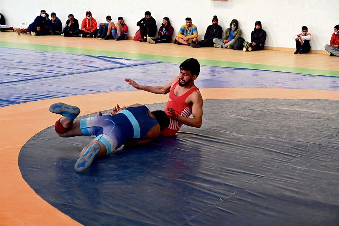 Sumit bags wrestling gold on opening day