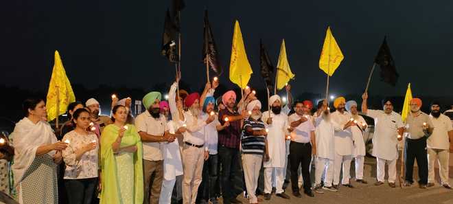 Amritsar residents hold candle march against Lakhimpur violence