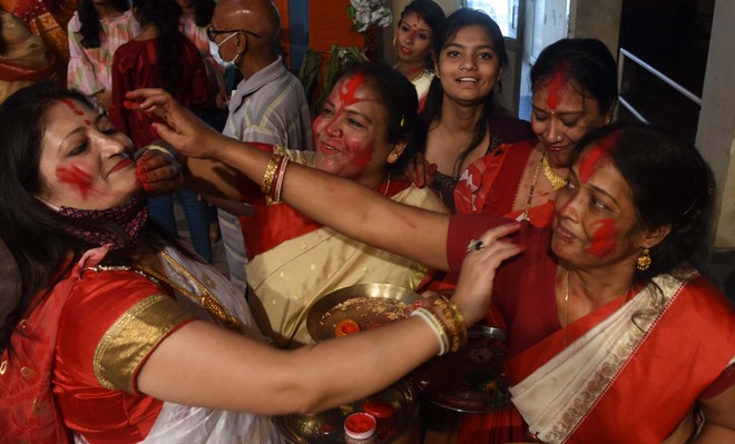 ‘Sindoor Khela’ rituals mark end of Durga Puja