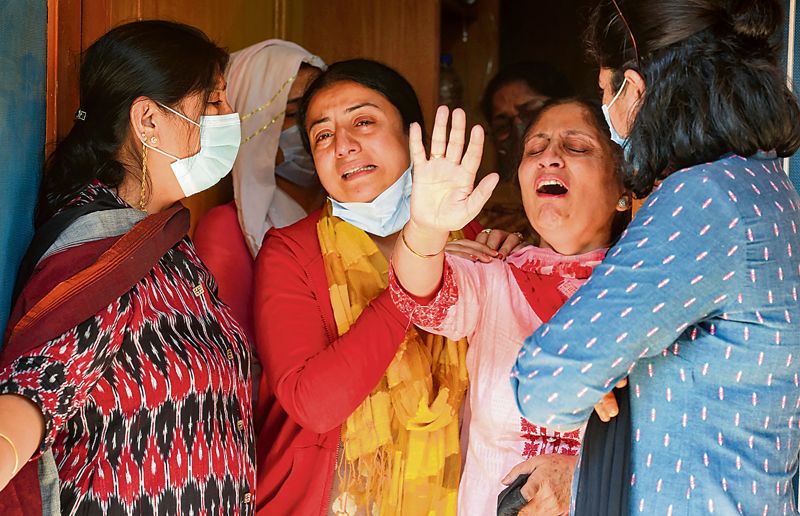 With tears, resolve, Kashmiris bid adieu to slain pharmacist