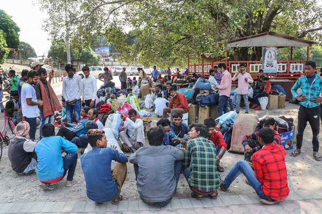 Fleeing Kashmir, migrants make a beeline for railway stations, bus stands